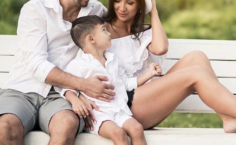 lifestyle: family sitting on bench