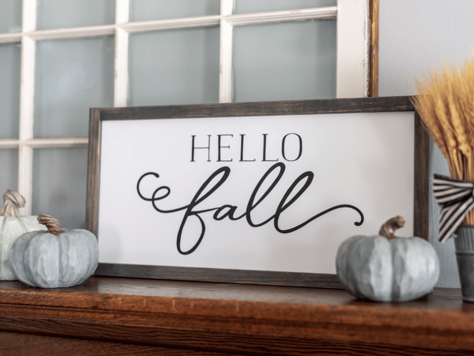 Hello fall sign and neutral colored pumpkins stylish fall decor
